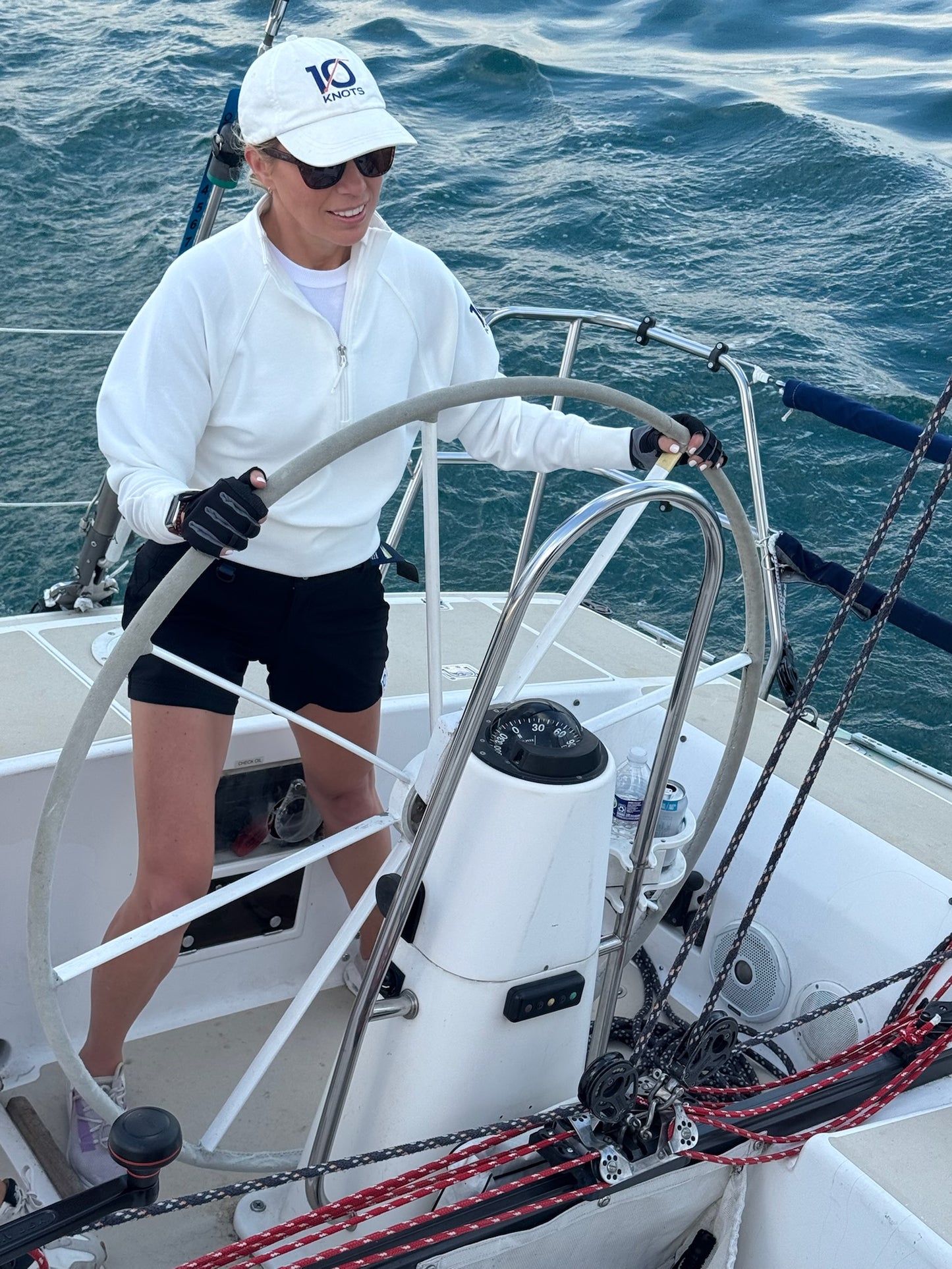 The 10 Knots Crew Hat at the Helm