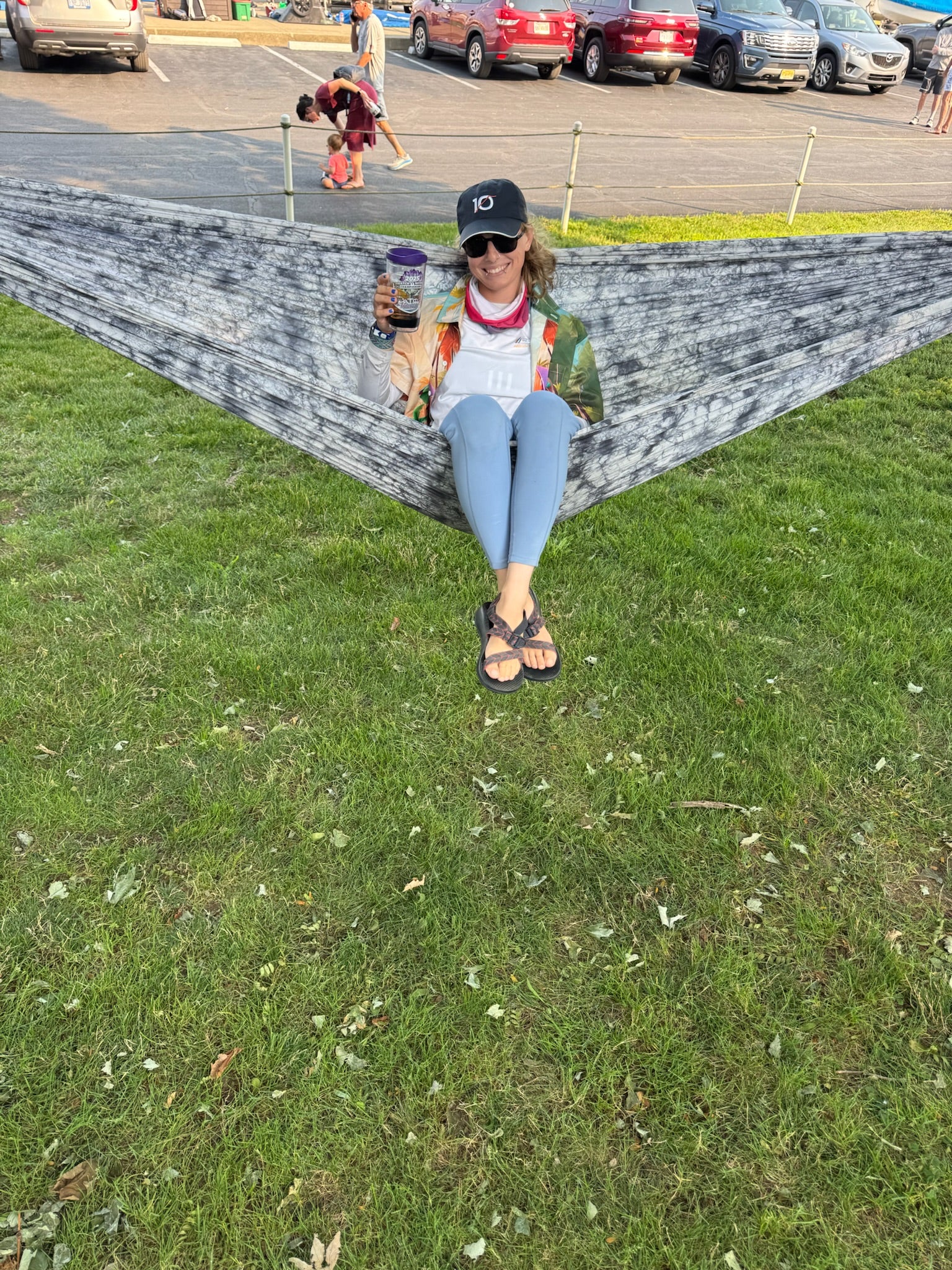 Post Race celebrating in the 10 Knots Great Lakes Hat the perfect sailing hat for on and off the water